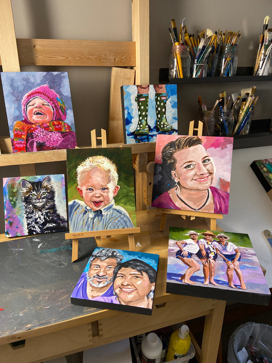 A collection of hand painted acrylic portraits painted on wood panels
