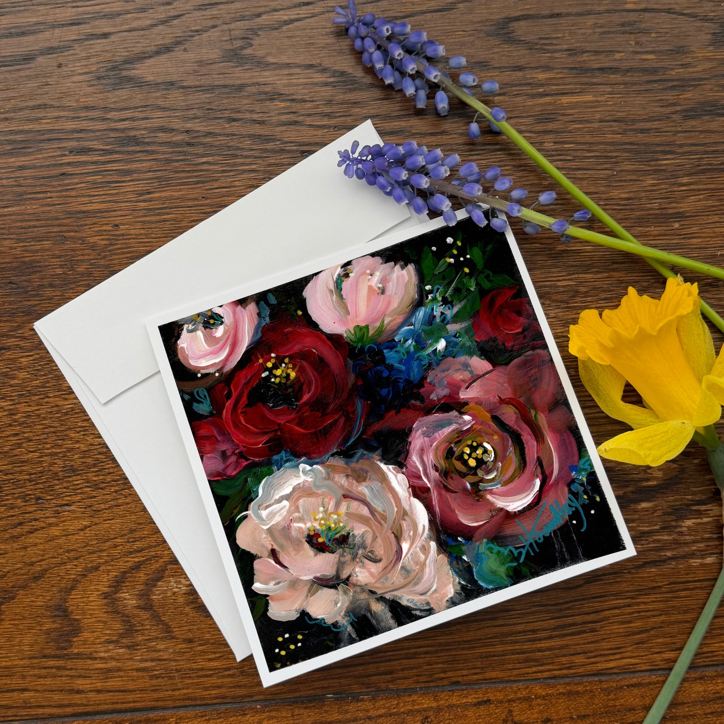 floral greeting card of red and peach peonies